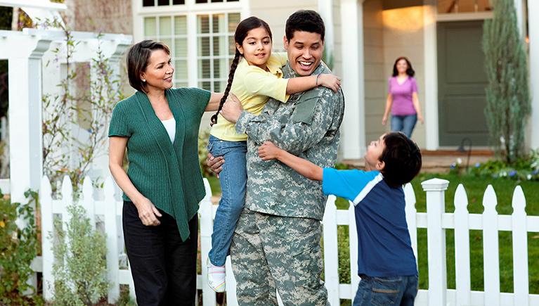 Photo of soldier with family