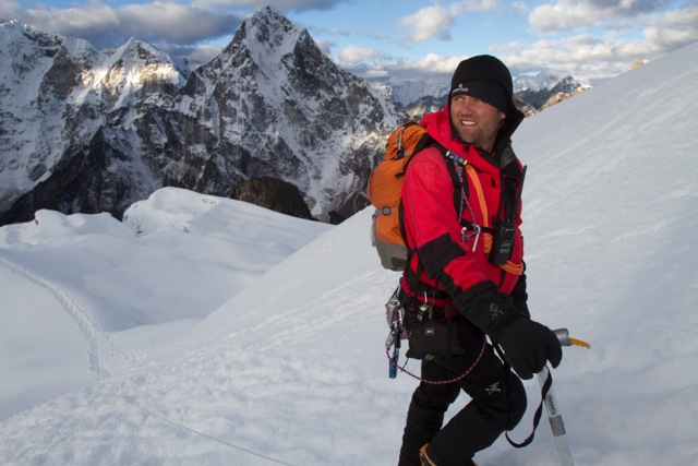 Author Jeff Evans hiking a top a snowy mountain.