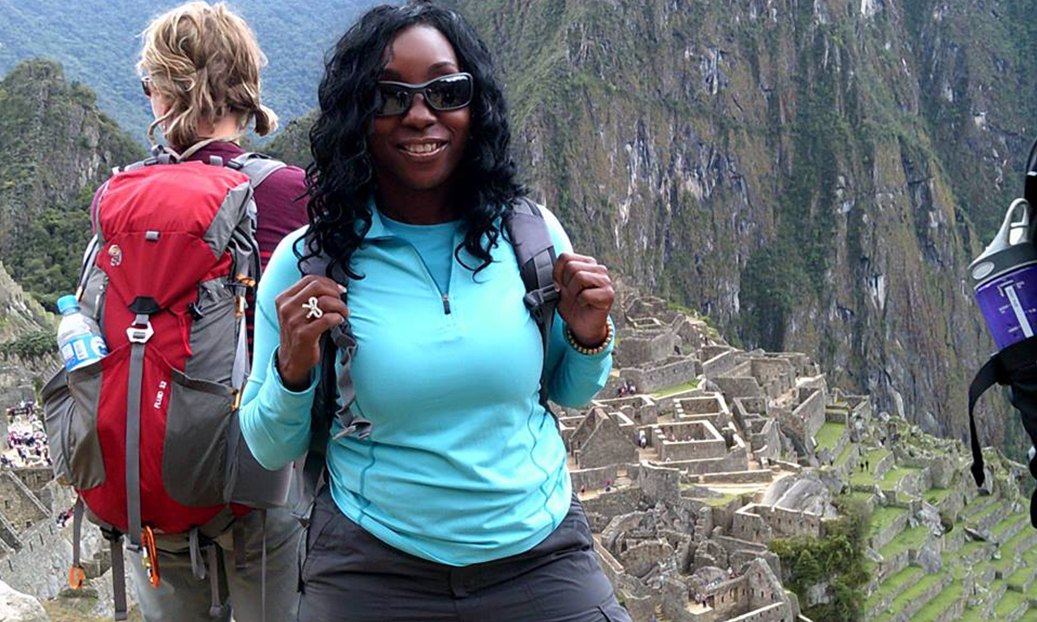 Author Michelle, atop a summit