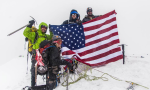 S2S team at the top of the summit. Pedro and teammates proudly hold the American Flag he discusses in his blog.