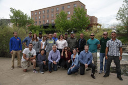 Team members, leaders and guides gather round for a group photo in Golden, Colorado. The team trained at St. Mary's Glacier for the first time together.