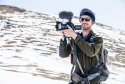 Videographer Rob capturing the climb. Photo Credit: Mike Herbener