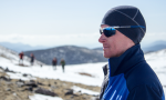 Profile image of craig, current soldier, in sunglasses, blue hat and blue jacket looking out ahead.