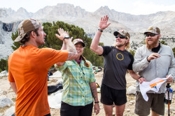 Leader Josh high fives team mates Stevi, Brian and David